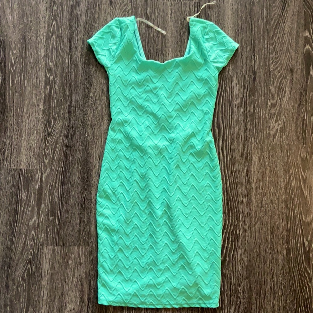 Teel bodycon dress with back cutout detail